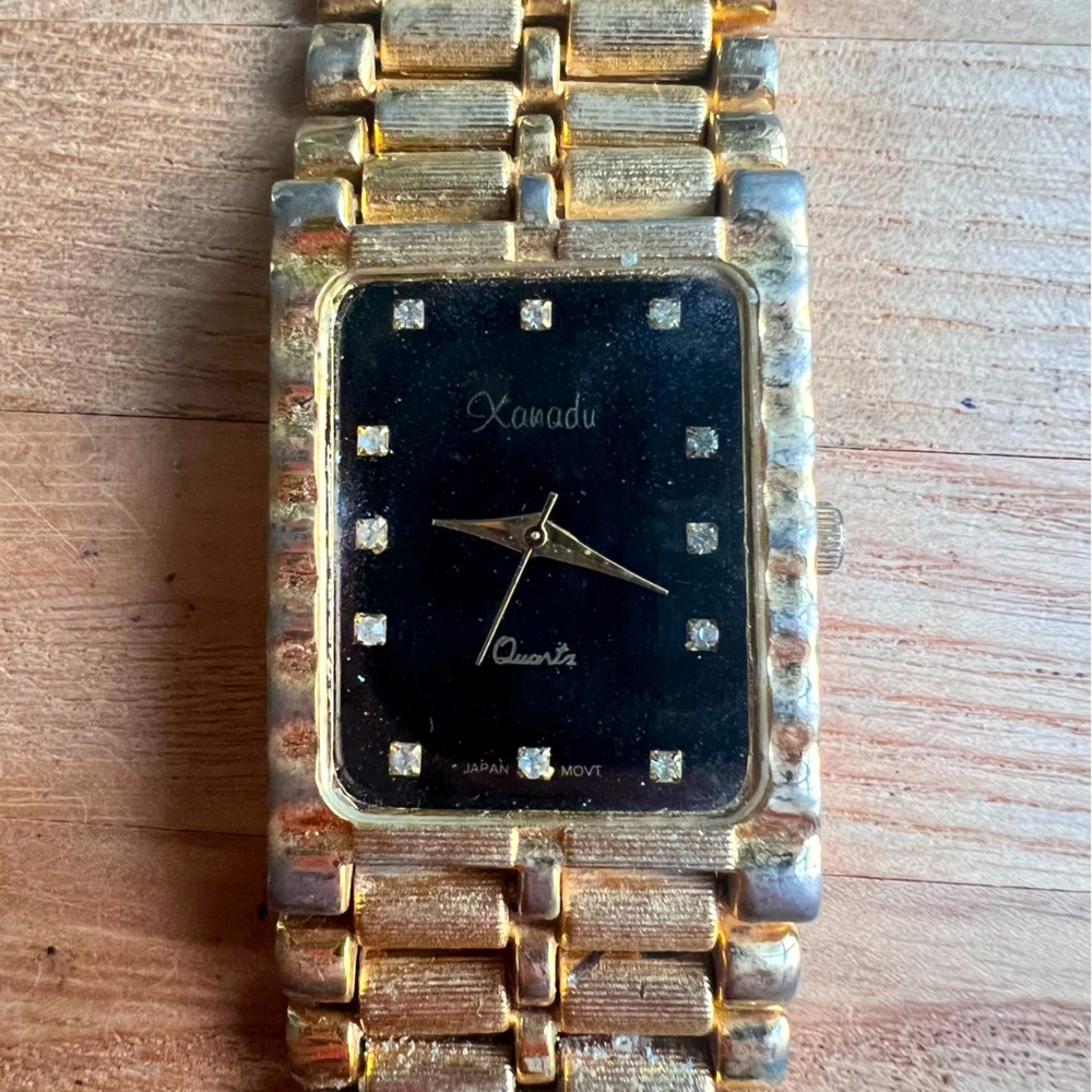 Vintage Xanadu ladies rectangular black dial gold tone dress Watch NEW BATTERY